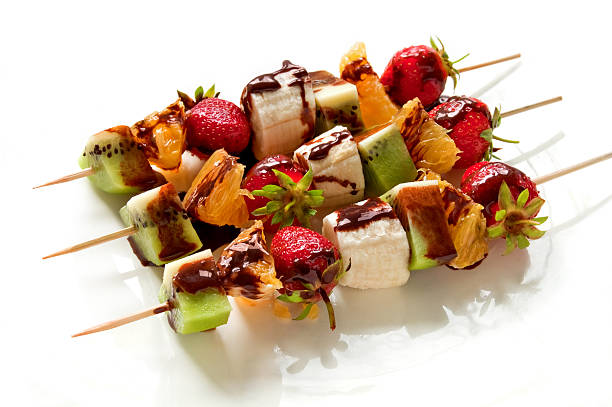 istock Fresh fruit on the skewers with chocolate 478308703