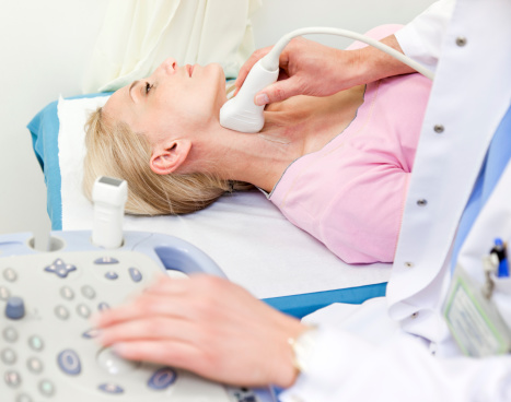carotid Doppler ultrasound test evaluationt of arteries performed on female patient