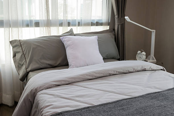 istock modern luxury bedroom with pillows and lamp 478309808
