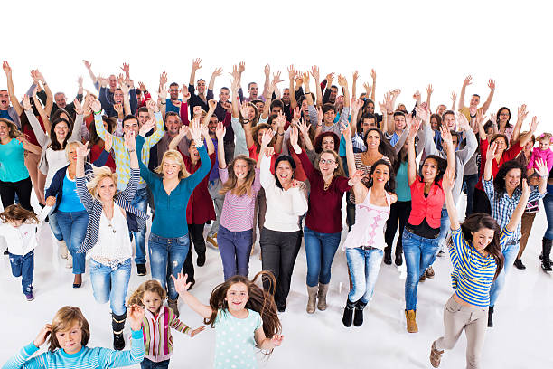 istock Large group of cheerful people running with raised arms. 478310376