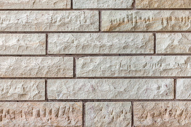 istock texture of yellow-brown rough brick wall 478311992