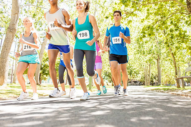 istock Marathon Runners Competing In Charity Race 478312520