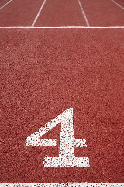 istock Number four signpost in an athletic running track 478314366