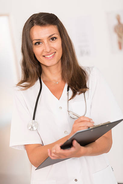 istock Portrait of beautiful young nurse 478314890