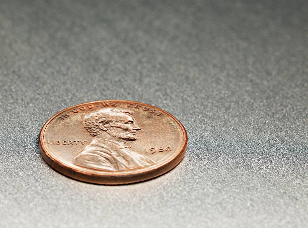 1 Dollar Cent with Lincoln on an alloy board