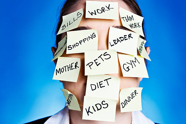 istock Too much! Woman totally obscured by responsibilities and tasks 478318539