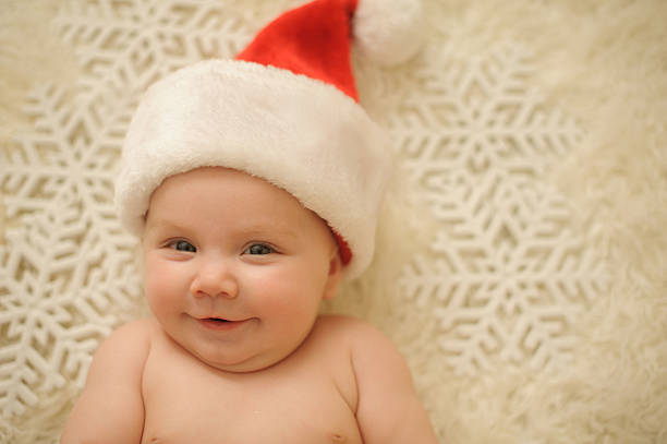 istock Cute Christmas Baby Wearing Santa Hat 478319059