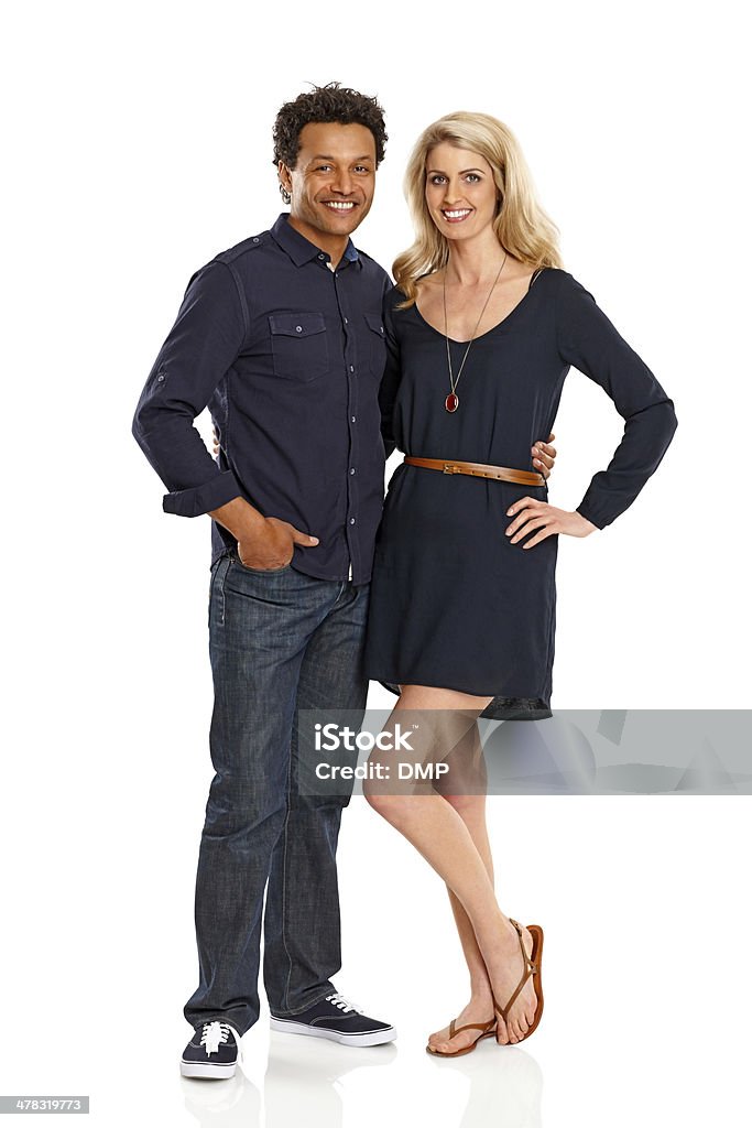 Pie feliz pareja junto en blanco - Foto de stock de Fondo blanco libre de derechos