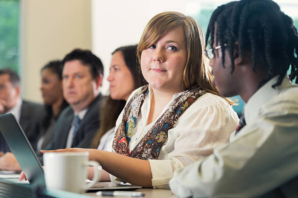 istock Young adults using laptop during job training business conference 478319780