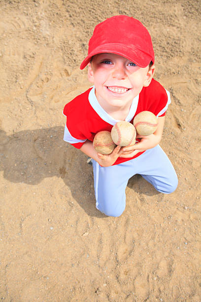 baseball-ball wusste jungen - batting gloves stock-fotos und bilder