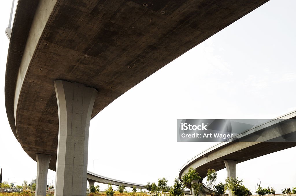 Freeway Bridge Arc The overpass of a freeway interchange in Southern California located at the merge of highways 67 and 52 in Santee, just east of San Diego. Arch - Architectural Feature Stock Photo