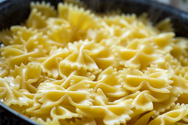 Close up of boiled farfalle italian pasta