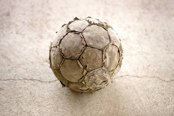 旧使用されるフットボール - soccer ball old leather soccer ストックフォトと画像