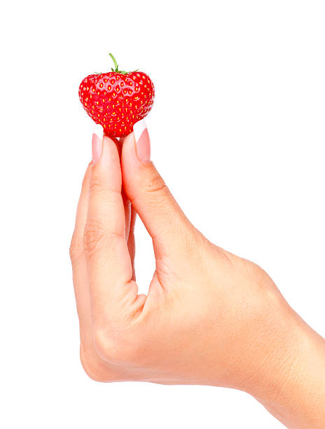 istock Strawberry in the woman's hand 478324856