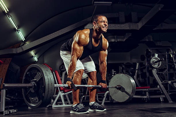 Dead Lift Body Builder performing heavy Dead Lift clean and jerk stock pictures, royalty-free photos & images