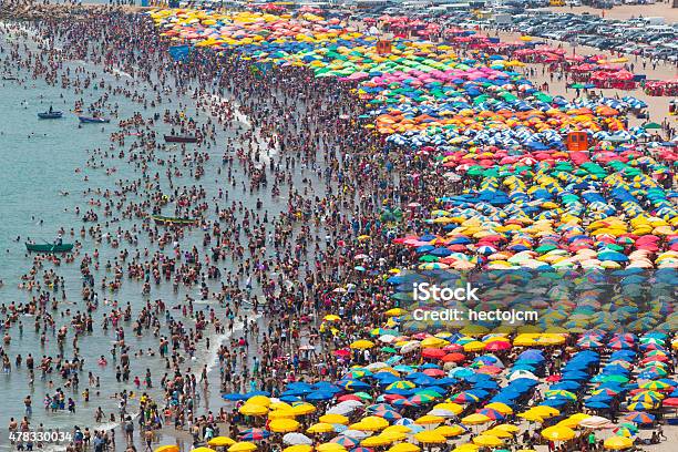 Crowded Beach Stock Photo - Download Image Now - Crowded, Beach, Beach Umbrella