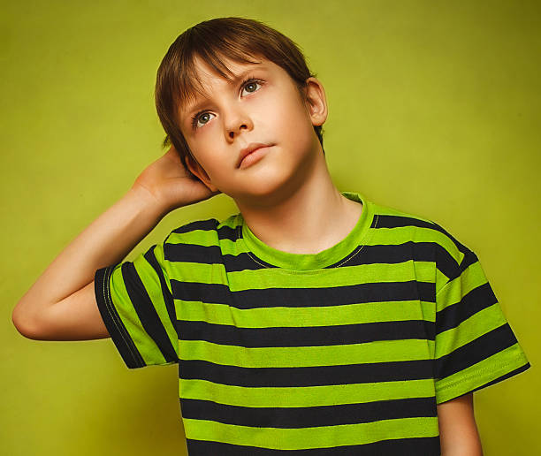 istock boy baby thinks kid looking disheveled thoughts idea isolated on 478334709