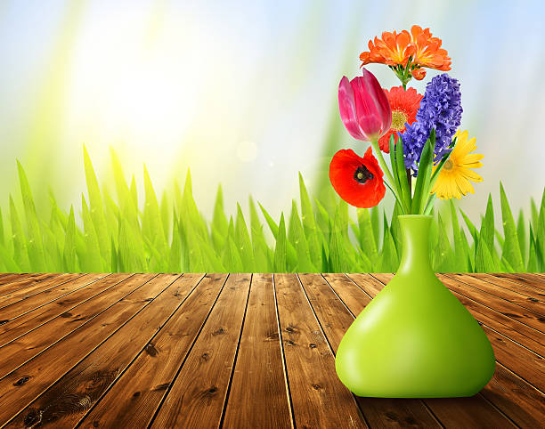 istock Spring flowers in the green decorative vase 478335066
