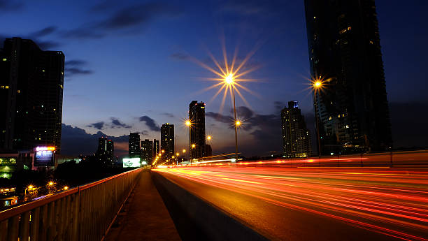 istock light trails on the modern building background in Bangkok Thailand 478335230