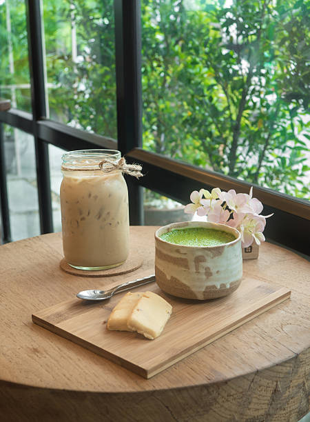 istock Matcha Green Tea and cookie on wooden tray 478335330