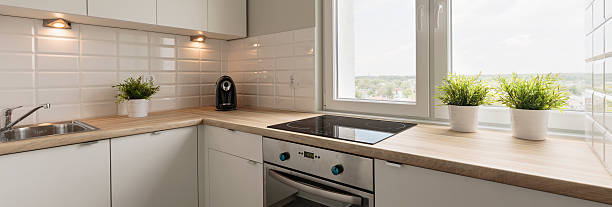 istock Wooden worktops and white cupboards 478335960