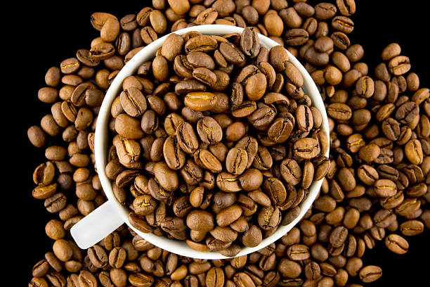 istock Aerial view of a cup filled with coffee beans 478337097
