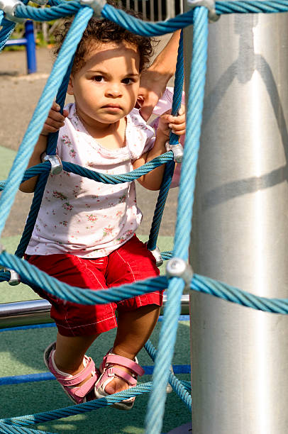 istock Toddler Playing in Playground 478338179