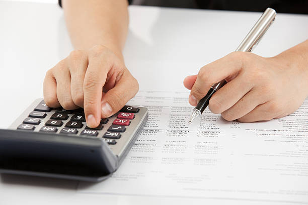 istock woman hand and business report 478339467