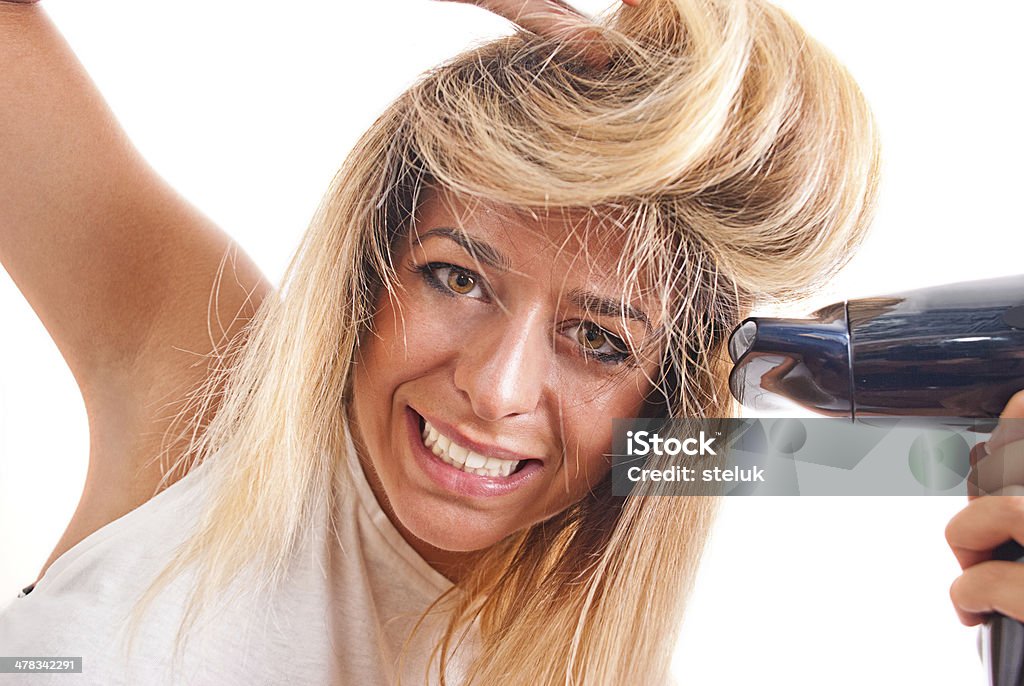 Menina loira com secador de cabelo - Foto de stock de 20-24 Anos royalty-free