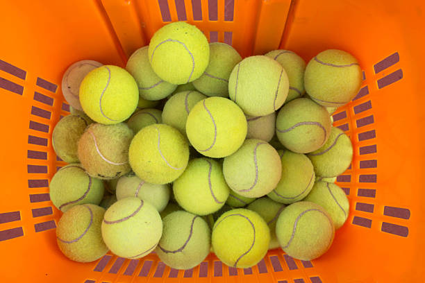 istock Tennis balls in  basket 478343830
