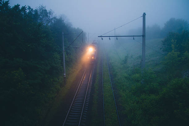 istock Train in fog at dawn 478344082