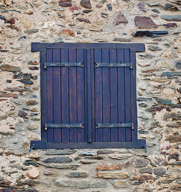 istock Window  in  the stone wall  in France 478344734