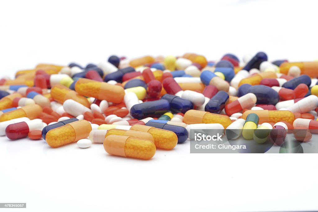 Pills isolated on white background Addiction Stock Photo