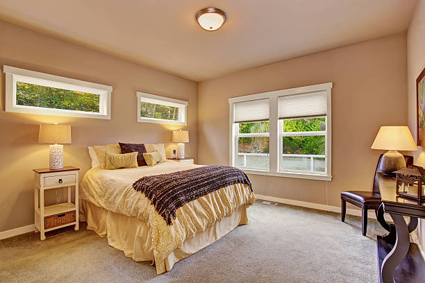 istock Bright bedroom with carpet and windows. 478348482