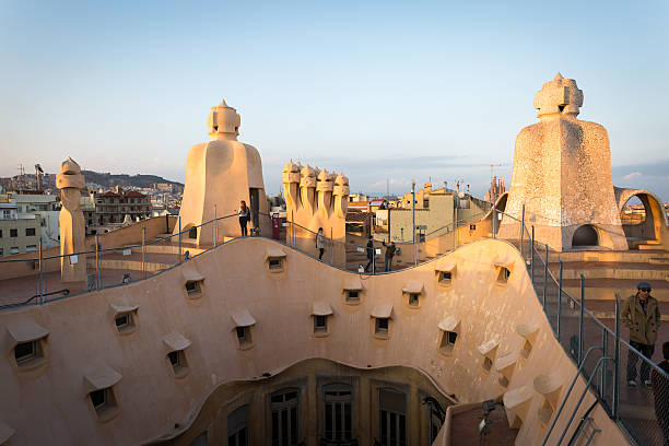Figueres, Spain - 19 September 2013 - Giant eggs set on a post against the sky as an example of surreal architectural elements of the facade of Dalí Theatre-Museum, a former Municipal Theatre of Figueres, considered to be the last great work of Salvador Dalí.