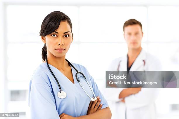Confident Female Nurse In Hospital Stock Photo - Download Image Now - 20-24 Years, 20-29 Years, 2015