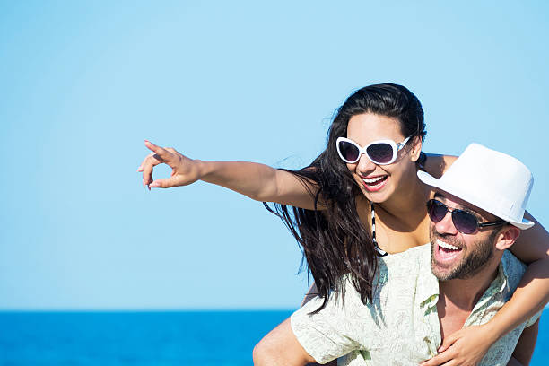 istock Piggyback ride at the beach 478353852