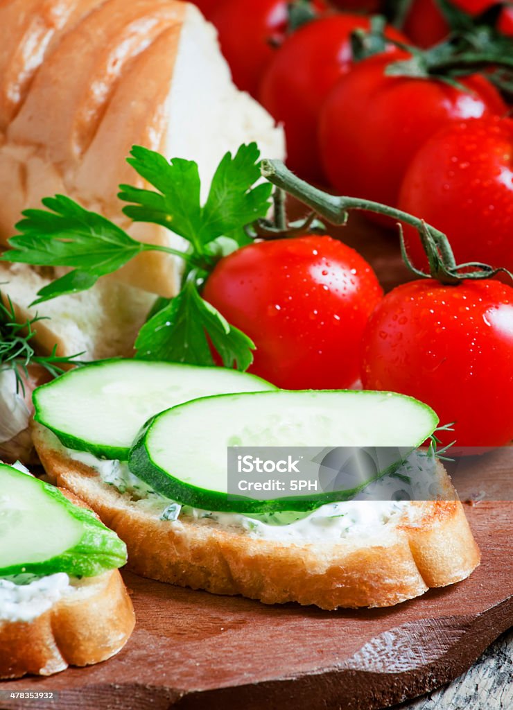 Bruschetta with white sauce and cucumber Bruschetta with white sauce and cucumber, selective focus 2015 Stock Photo