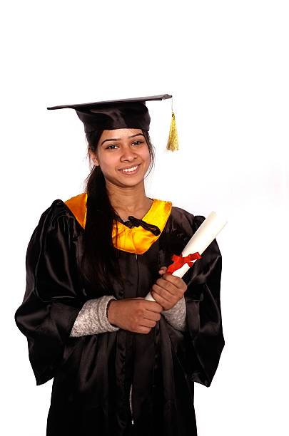 istock Asian graduate holding degree over white background. 478357427