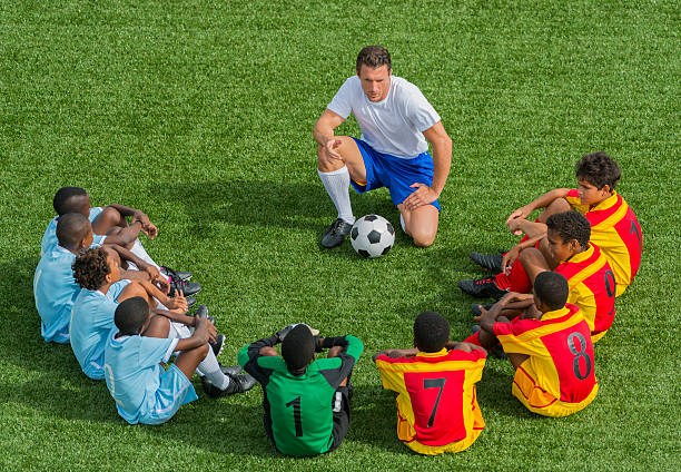 istock Football Team With Coach 478360599