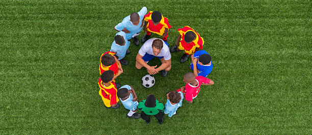 istock Kids Soccer Team With Their Coach 478368221