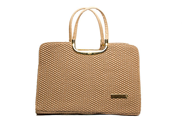 istock luxury fawn female hand bag 478368559