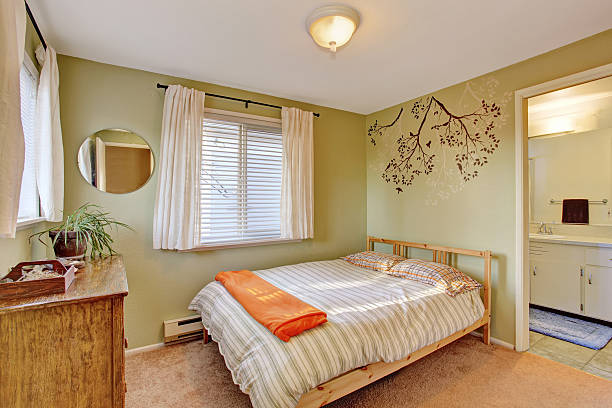istock Bright bedroom with green walls. 478371312