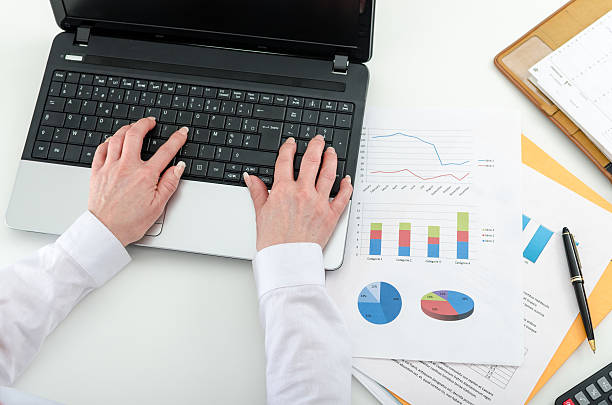 istock Businesswoman typing on a laptop 478372548