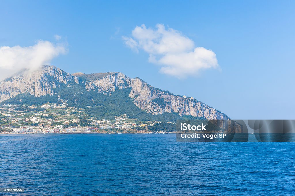 View of  Capri island on the boat Panorama view of Capri Island on the boat from the Mediterranean Sea 2015 Stock Photo