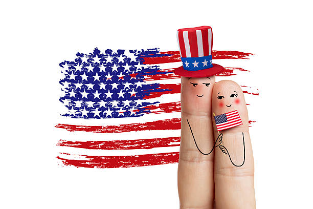 istock Couple is celebrating july 4th and holding US flag 478379102
