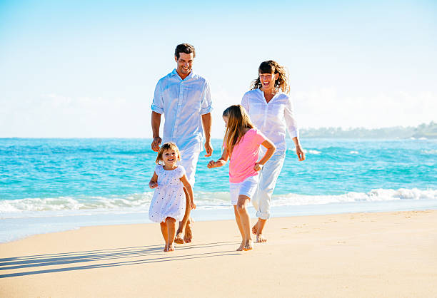 istock Happy Family on the Beach 478384821