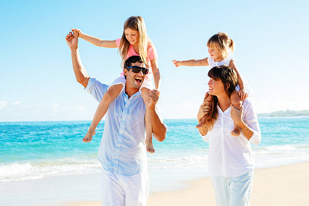 istock Happy Family on the Beach 478385091