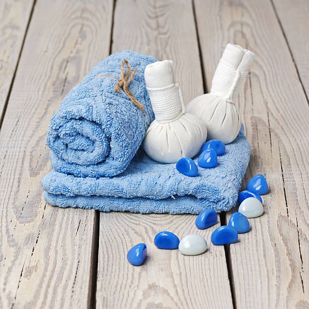 istock Spa massage setting with thai herbal compress stamps. 478387037