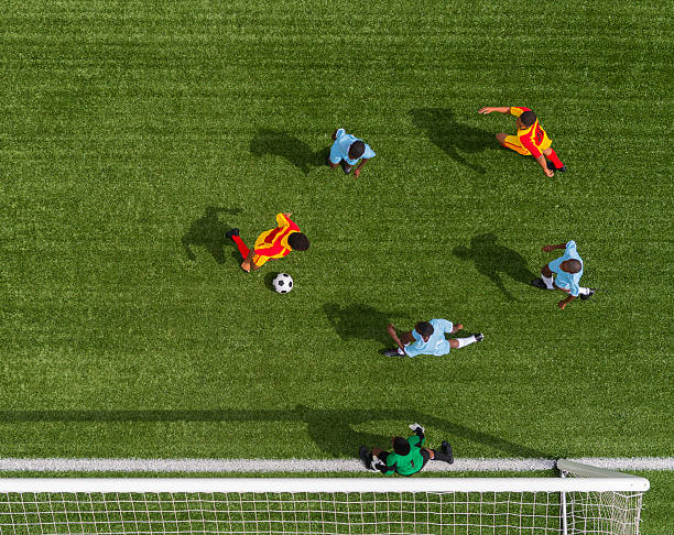 istock Young Boys Playing Football 478388249